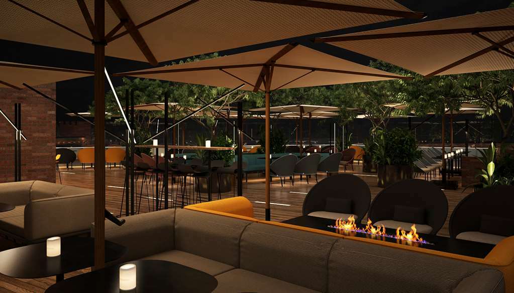 Golden Tulip Design Tbilisi Hotell Restaurang bild