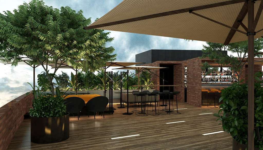 Golden Tulip Design Tbilisi Hotell Restaurang bild
