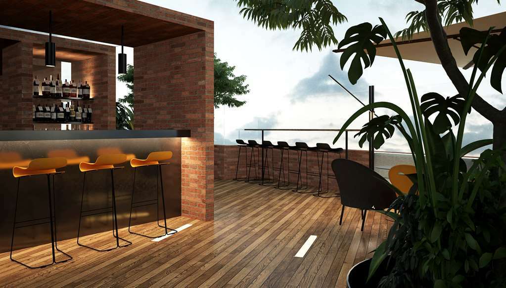 Golden Tulip Design Tbilisi Hotell Restaurang bild